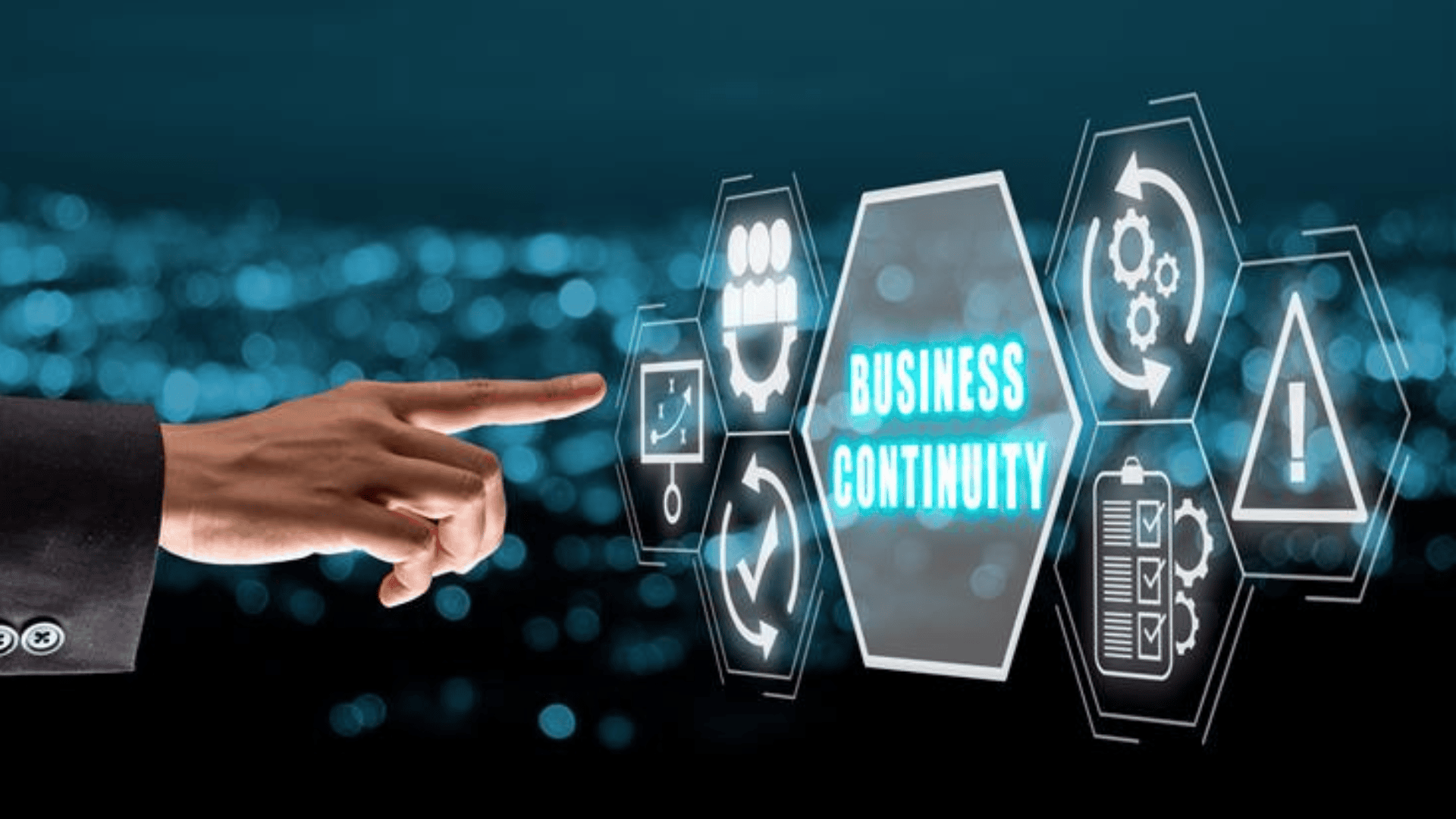 man pointing to hexagon that says business continuity